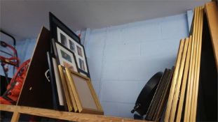 Quantity of framed pictures and a clock