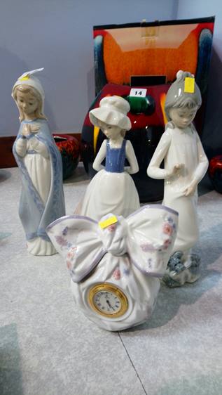 Three Nao figures and a Lladro clock