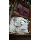 Box of linen and a box of books