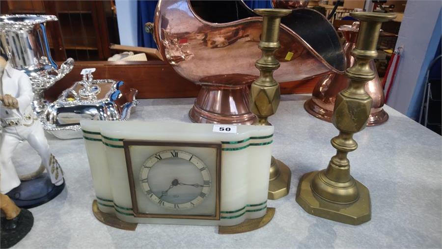 A pair Queen of Diamonds candlesticks and a clock