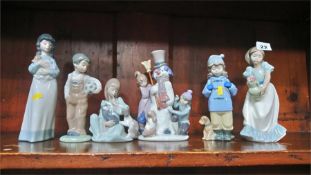 Four Nao and two Lladro figures (6)