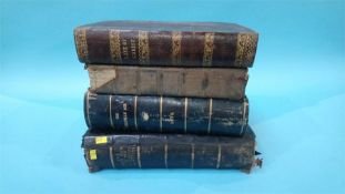 Four leather bound bibles