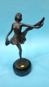 A bronze figure of a Dancer