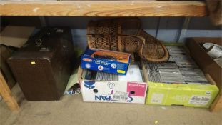 Two boxes of CDs and a sewing machine