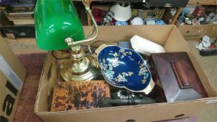 A box containing telephone, tea caddy, desk lamp etc.