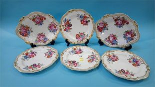 Part dessert service with embossed floral and gilt decoration