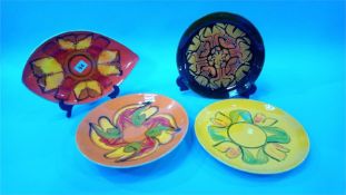 Four various Poole plates