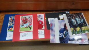 A box of signed football autographs; to include, Gary Lineker, Michael Owen, Lampard, Wayne Rooney