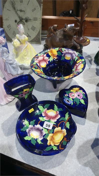 A set of four matching pieces of Maling china