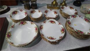 A quantity of Royal Albert Old Country Rose bowls and dishes