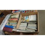 Box of books and a box of postcards