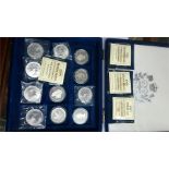 A collection of 16 silver proof coins