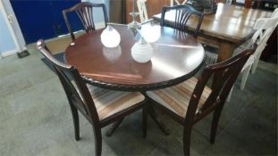 Circular table and four chairs