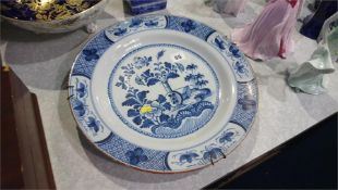A 19th century tin glazed earthenware plate