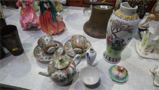 Two Canton enamelled tea cups and saucers and a teapot etc.
