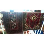 Two small rugs