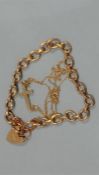 A 9ct gold bracelet and chain. 18.3 grams