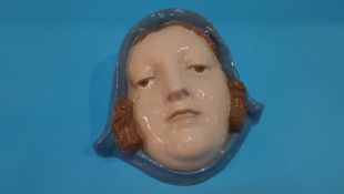 A Royal Doulton wall mask of a Dutch girl, printed mark and impressed number 813