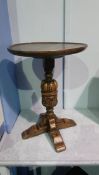 A small Old Charm oak circular carved occasional table. 33cm diameter