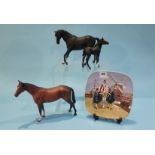 A Beswick 'Black Beauty', two other horses and a Christmas plate (4)