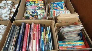Various comics, books and annuals in four boxes