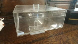 A clear Perspex jewellery box. 30cm wide