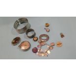 A silver bangle, charm bracelet etc.