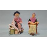 A Royal Doulton figure 'The Family Album', HN 2321 and 'The Homecoming', HN 3295 (2)