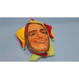 A Royal Doulton 'Jester' wall mask, HN 1630, impressed number 933. 27cm length