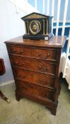 A reproduction mahogany chest of drawers, with four long graduated drawers, 59cm wide