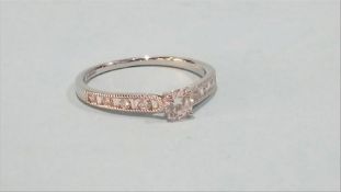 An 18ct white gold diamond ring