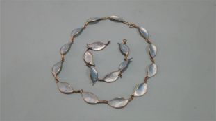A Norwegian 925 standard enamelled bracelet and necklace, the links in the form of leaves