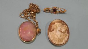 A cameo brooch, 9ct brooch and a gold mounted necklace