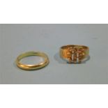 A 9ct gold ring and another yellow metal ring