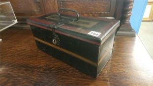 A rectangular tin box. 35cm wide