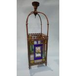 An Edwardian brass hanging ceiling light, with four leaded glass panels. 66cm height