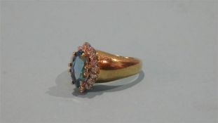 A 9ct gold topaz and diamond ring