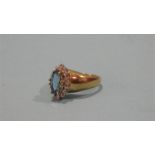 A 9ct gold topaz and diamond ring