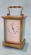 A brass carriage clock, the dial signed Matthew Norman, London