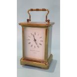 A brass carriage clock, the dial signed Matthew Norman, London