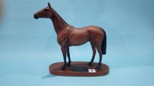 A Beswick model of 'Red Rum' on a wooden plinth