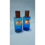 Two blue glass Chemist bottles 'Thea Nigra' and 'Sulfur Sublim Lot'