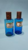 Two blue glass Chemist bottles 'Thea Nigra' and 'Sulfur Sublim Lot'