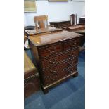 A small reproduction mahogany chest of drawers. 62cm wide