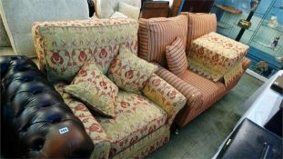 A two seater settee and armchair