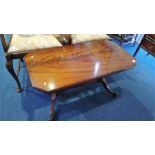 A mahogany coffee table