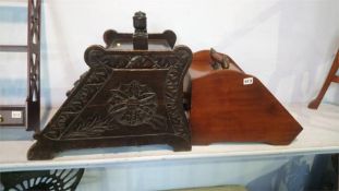 A heavily carved oak coal box and walnut coal box