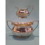 A silver cream jug and sugar bowl, Jones and Crompton, Birmingham 1902. 14.5oz