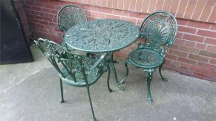 Garden table and three chairs