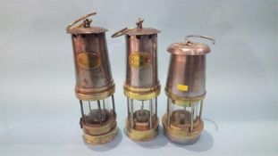 Three various miners lamps
